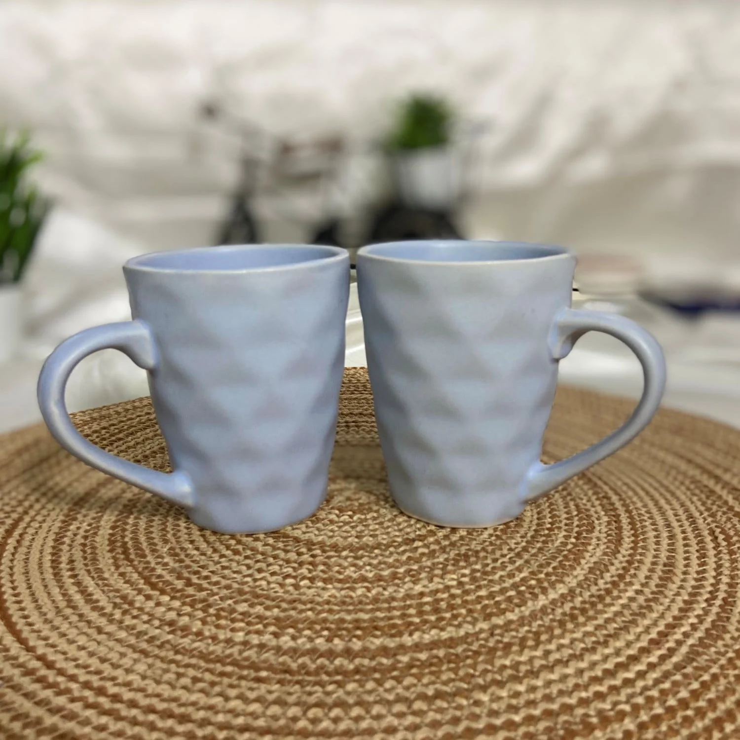 https://ceramicdining.com/wp-content/uploads/2023/09/Ceramic-Dining-Matte-Light-Blue-Diamond-Shaped-Coffee-Mugs-Set-of-2-Creative.jpg.webp